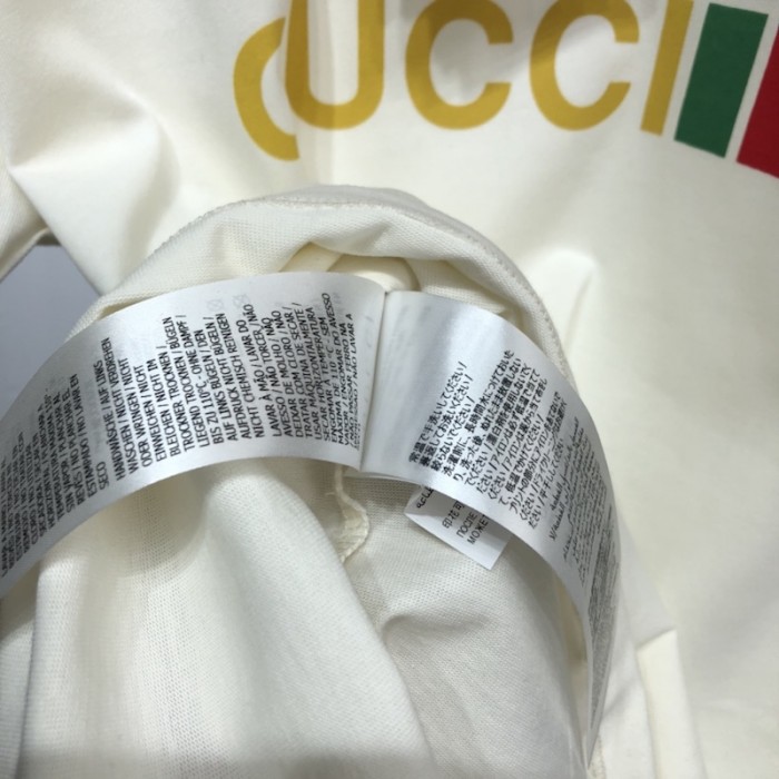 G*u*i x the north face t shirt cream