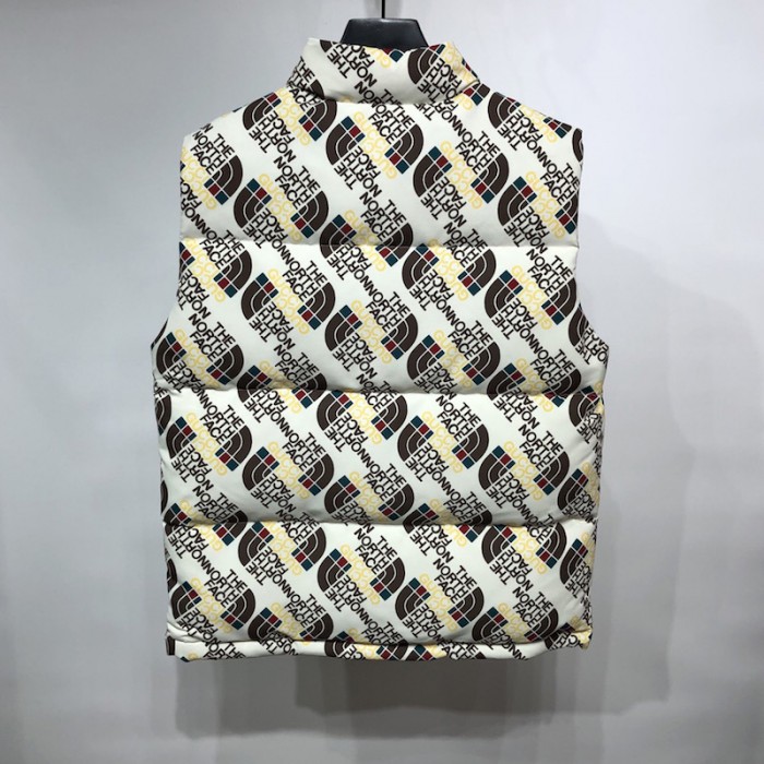 the north face x G*u*i nylon vest yellow