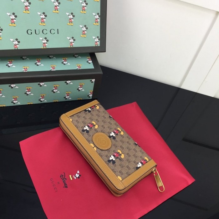 disney x G*u*i zip around wallet
