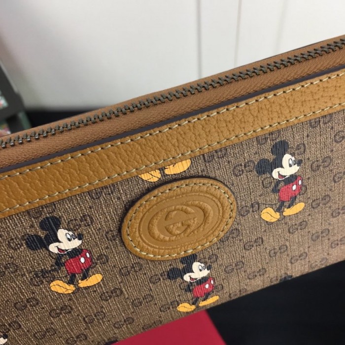 disney x G*u*i zip around wallet