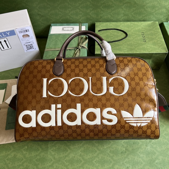 Ad*s x g*u*i large duffle bag 702422 brown