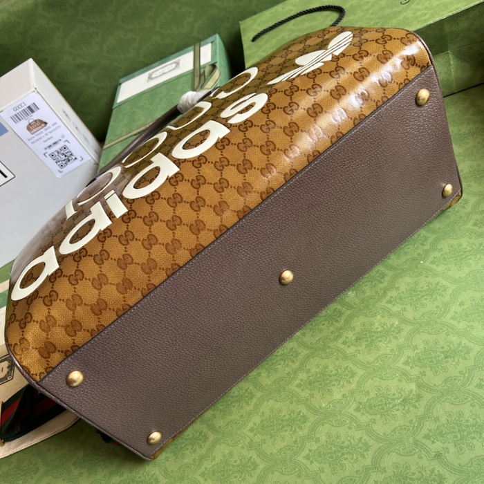 Ad*s x g*u*i large duffle bag 702422 brown