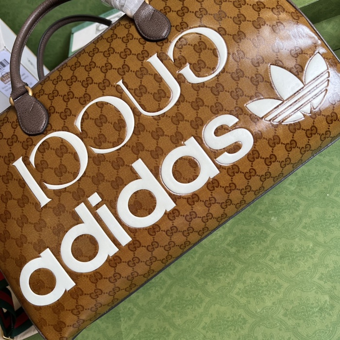 Ad*s x g*u*i large duffle bag 702422 brown
