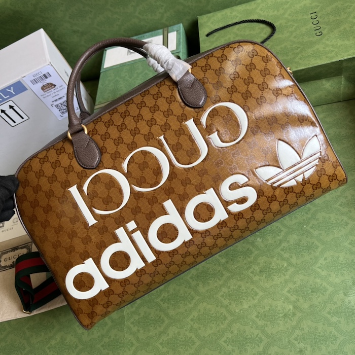 Ad*s x g*u*i large duffle bag 702422 brown