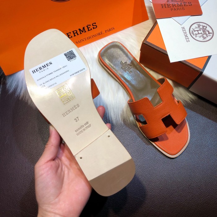 H**mes women oran sandals in epsom leather orange