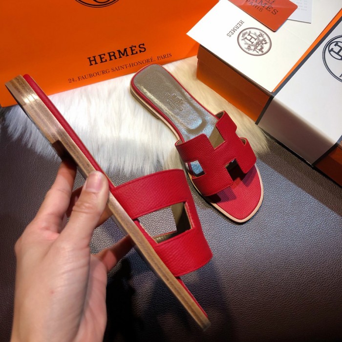 H**mes women oran sandals in epsom leather red