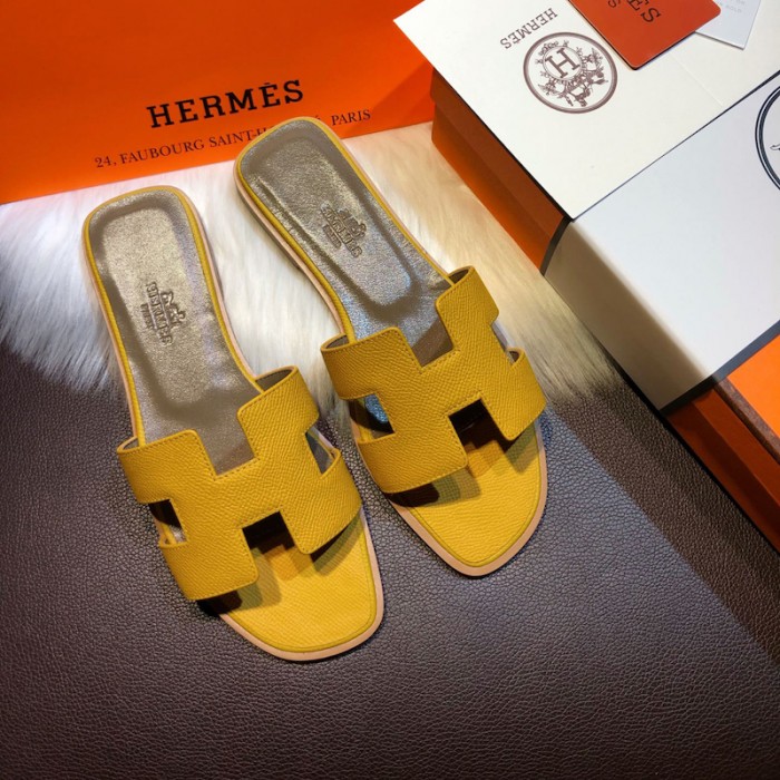 H**mes women oran sandals in epsom leather yellow