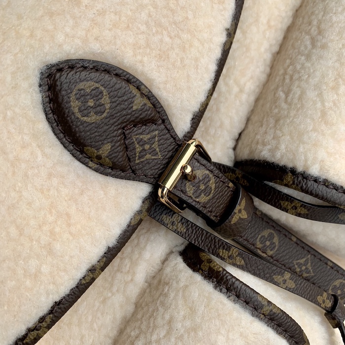 l**is V*t*n monogram shearling backpack m23384