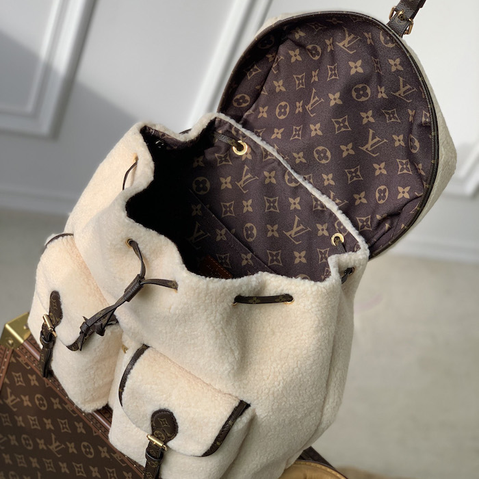 l**is V*t*n monogram shearling backpack m23384