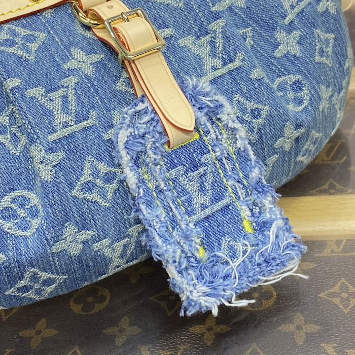 l**is V*t*n monogram denim high rise bumbag m46837