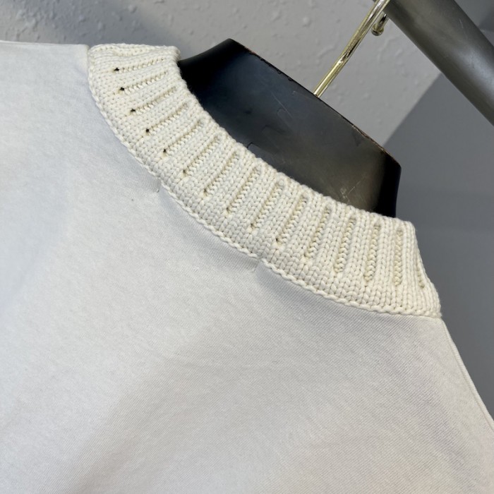 l**is V*t*n embroidered l**is V*t*n mockneck tee 1a9gmo