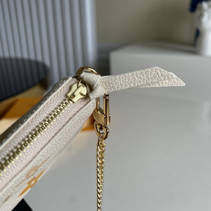 LV Monogram Empreinte Mini Pochette Accessoires Bag M80502