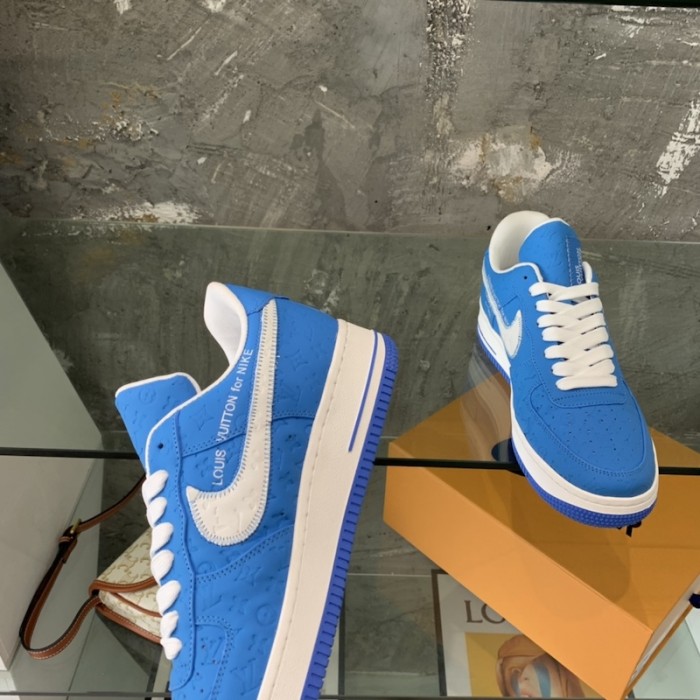 l**is V*t*n x nike air force 1s in blue