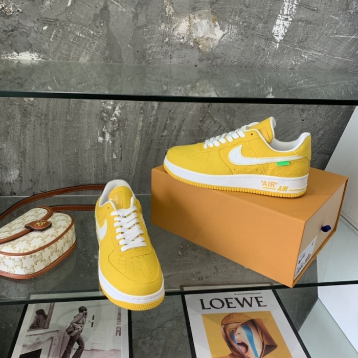 l**is V*t*n x nike air force 1s in yellow