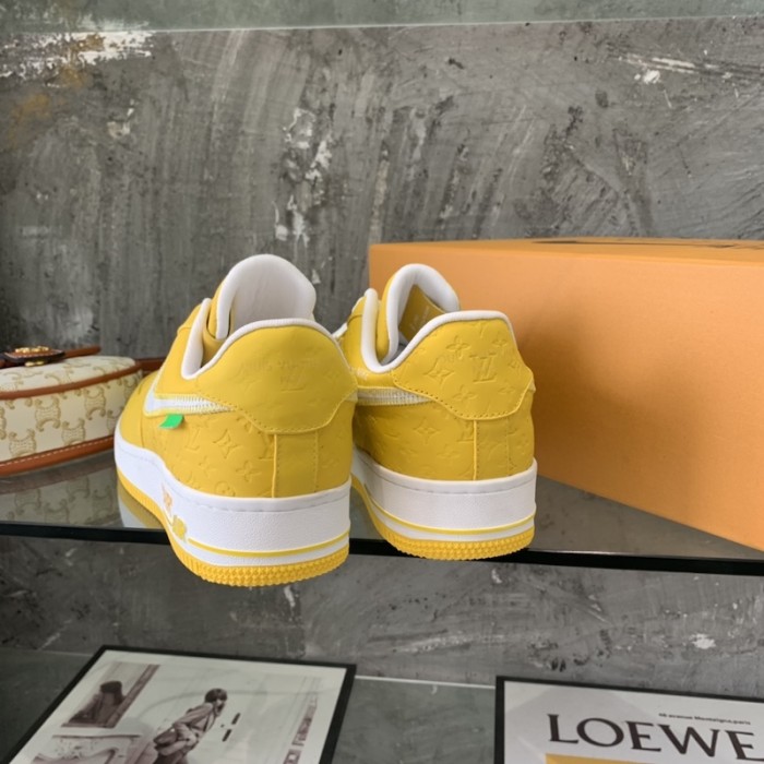 l**is V*t*n x nike air force 1s in yellow