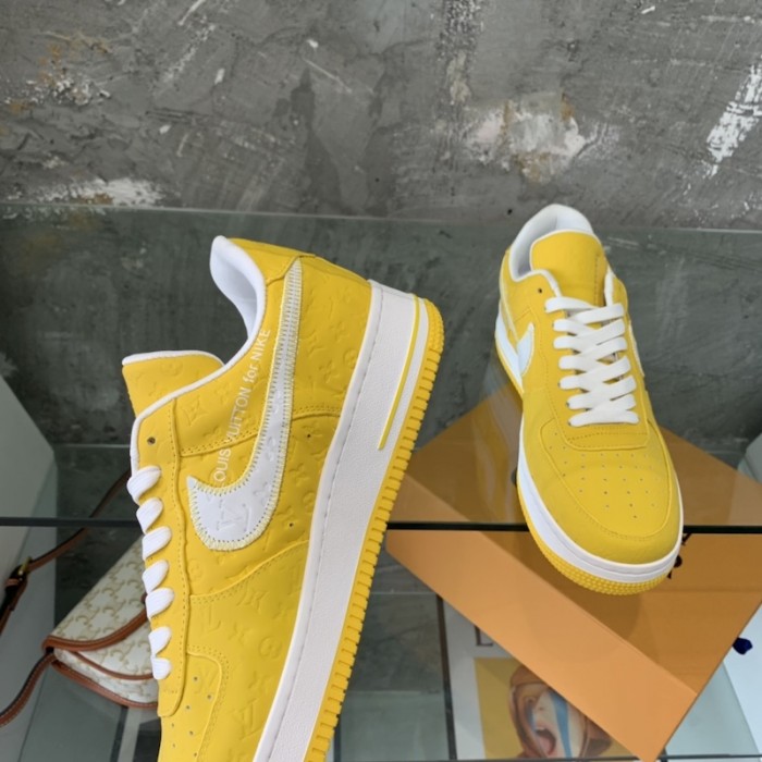 l**is V*t*n x nike air force 1s in yellow