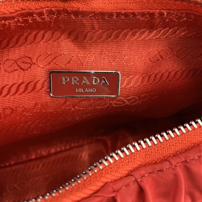 Pra*a nylon and saffiano leather mini bag red