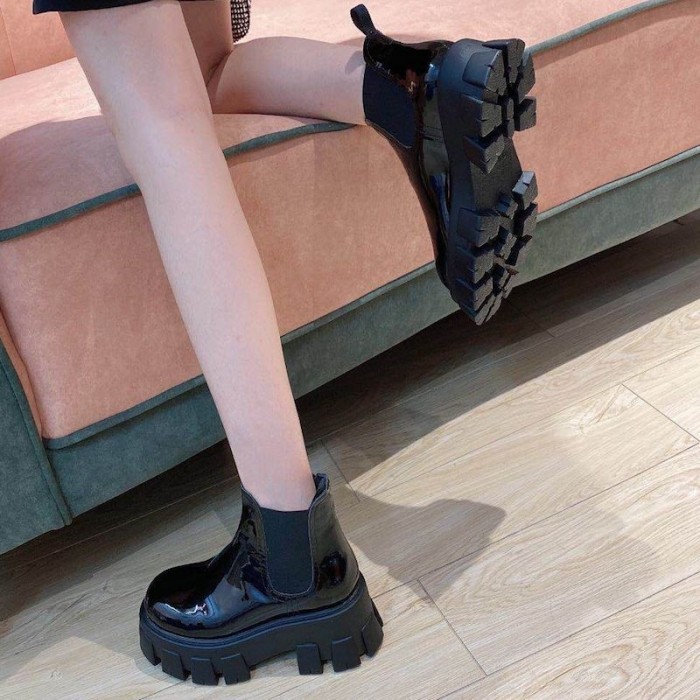 Pra*a monolith patent leather booties black