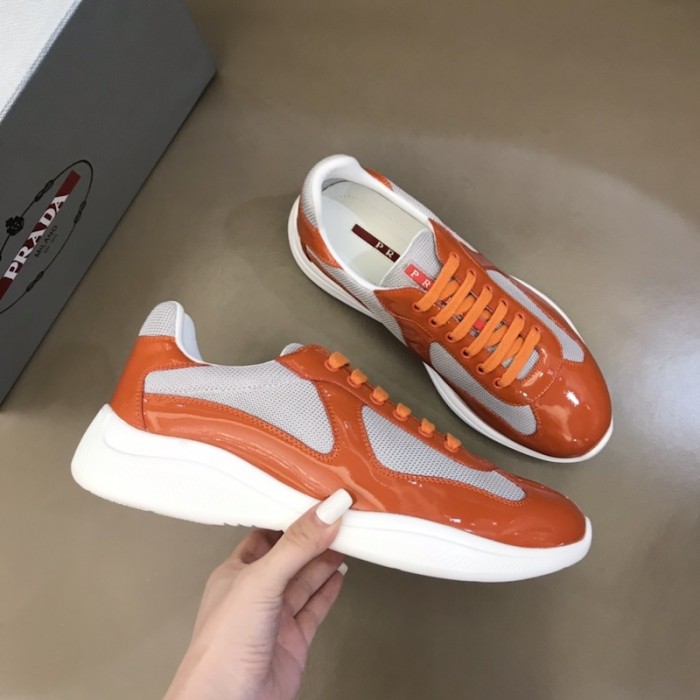 Pra*a new america''s leather and technical fabric sneakers orange