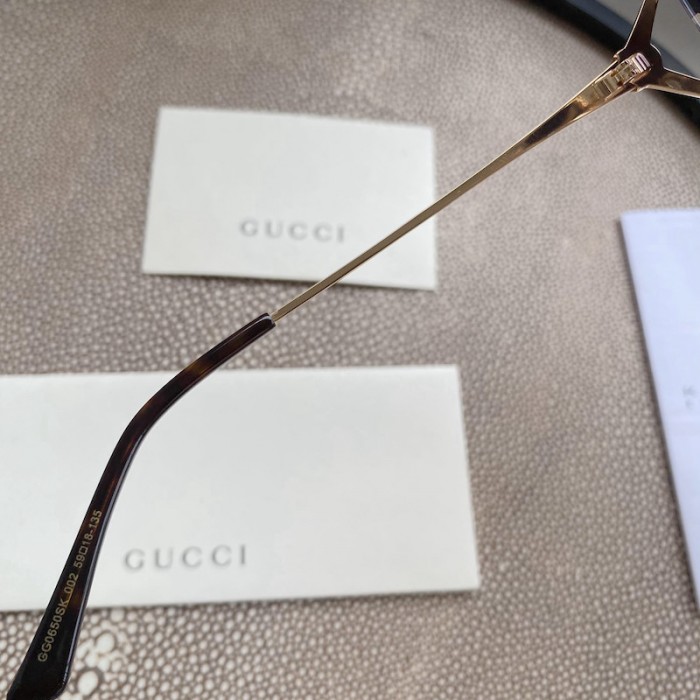 G*u*i oval metal sunglasses white